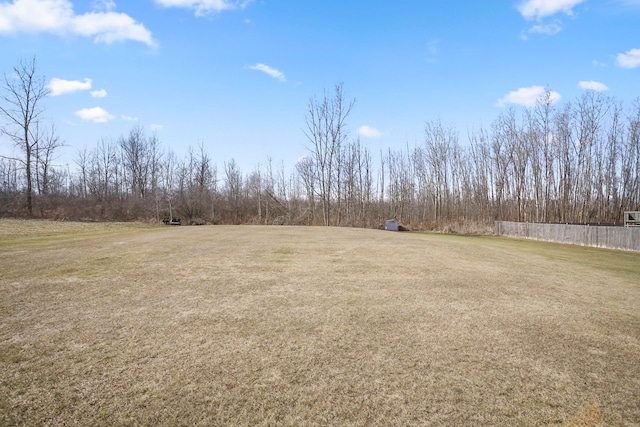 view of yard with fence