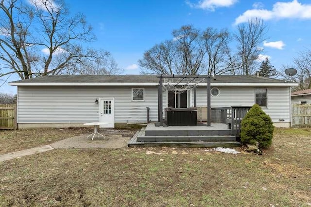 back of property with cooling unit, fence, and a wooden deck