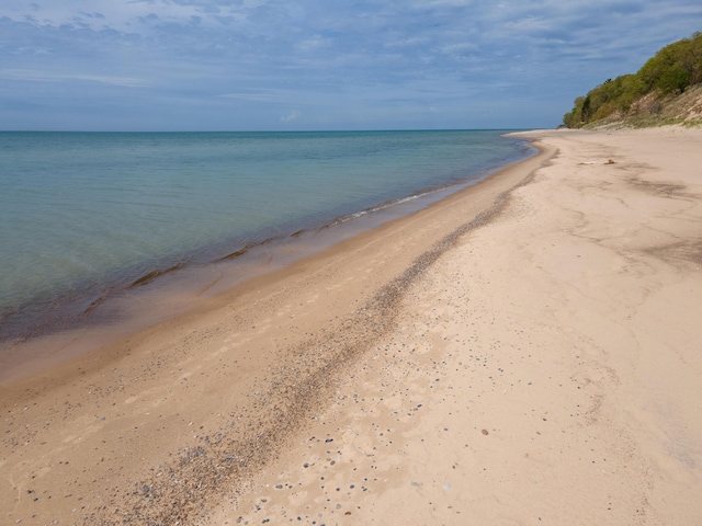 view of water feature featuring a beach view