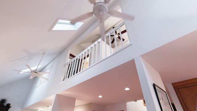 interior details with recessed lighting, ceiling fan, and a skylight