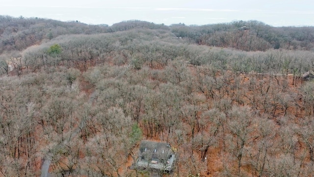 bird's eye view with a view of trees