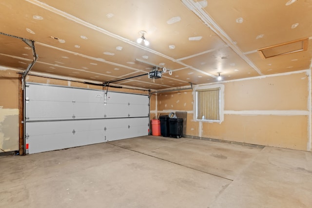 garage featuring a garage door opener