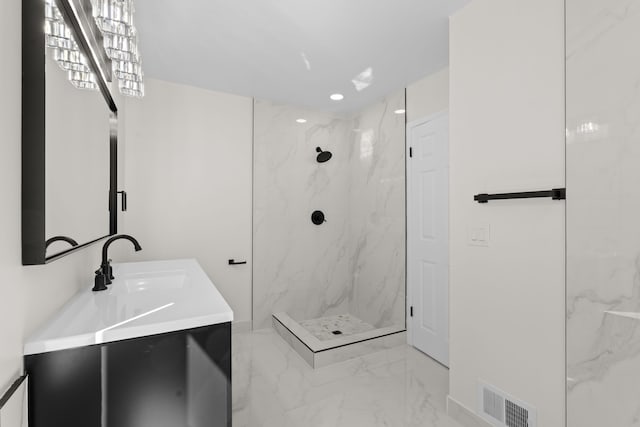 bathroom featuring vanity, visible vents, a marble finish shower, recessed lighting, and marble finish floor