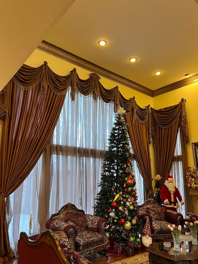 interior space with recessed lighting and crown molding