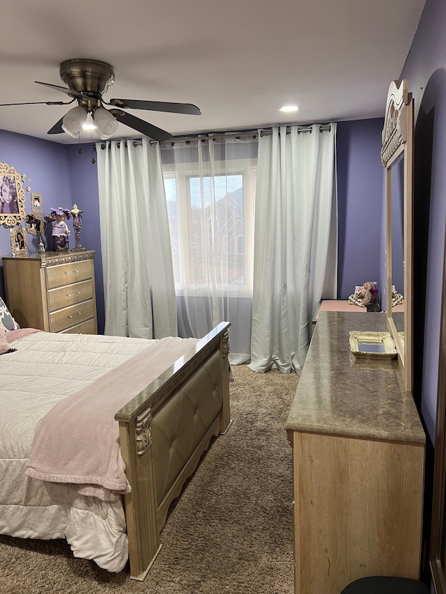 bedroom featuring carpet floors and a ceiling fan