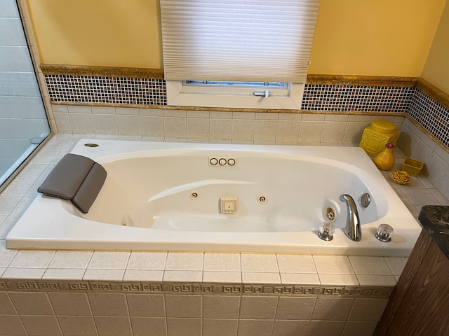 bathroom featuring a jetted tub