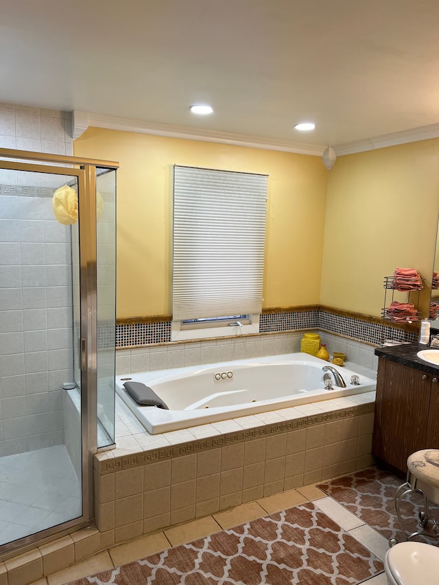 bathroom featuring a tub with jets, a stall shower, and crown molding