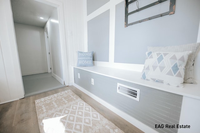 mudroom with visible vents and wood finished floors