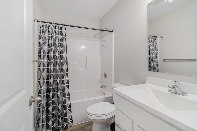 bathroom featuring toilet, shower / bathtub combination with curtain, wood finished floors, and vanity