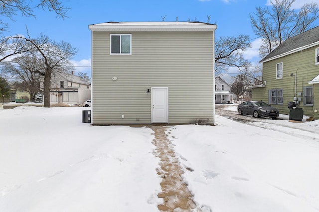 view of snow covered house