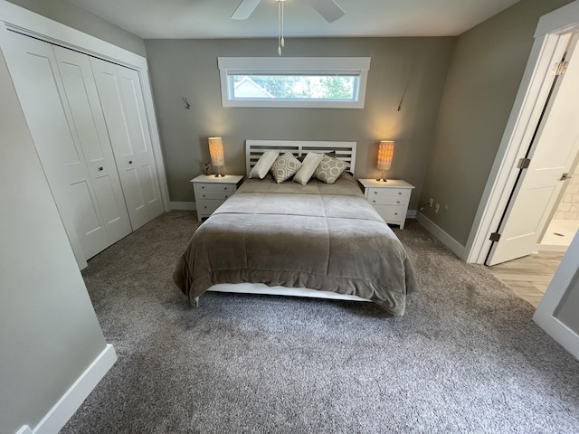 bedroom with ceiling fan, a closet, carpet flooring, and baseboards