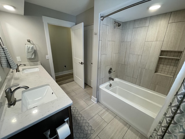 full bath featuring double vanity, shower / bathtub combination with curtain, a sink, and wood tiled floor