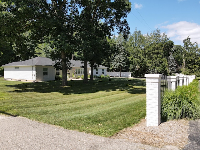 view of yard with fence