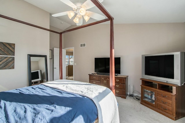 bedroom featuring lofted ceiling, a ceiling fan, visible vents, and light colored carpet