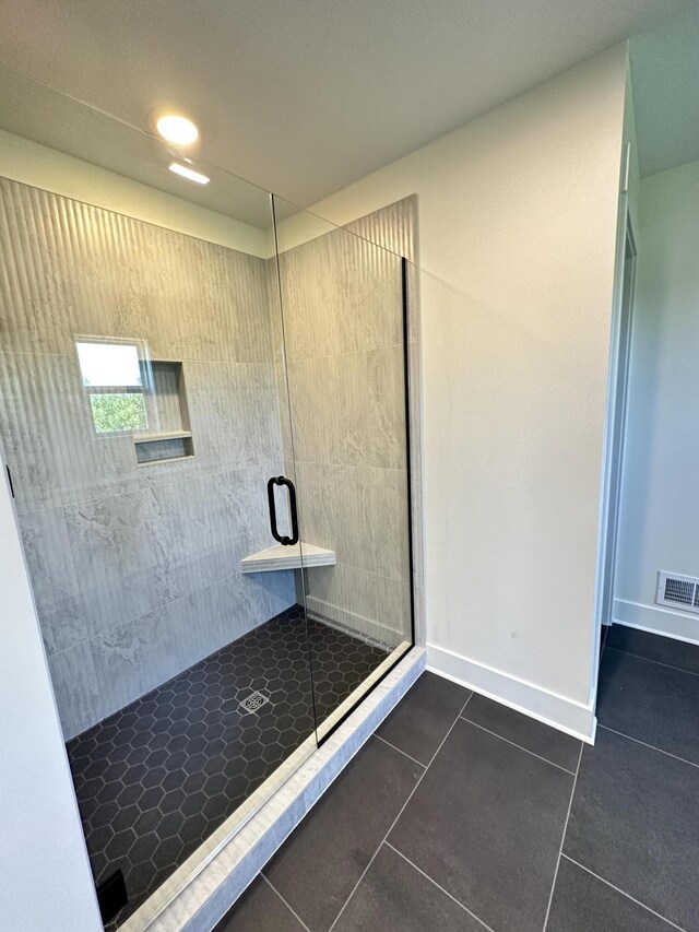 1846 Round Barn Dr, Hudsonville, MI 49426 - bathroom with tile patterned flooring and a stall shower