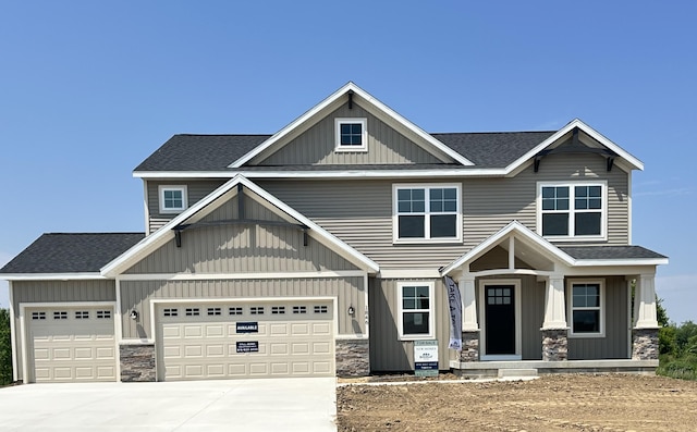 1846 Round Barn Dr, Hudsonville, MI 49426 - craftsman-style house featuring a shingled roof, concrete driveway, and a garage