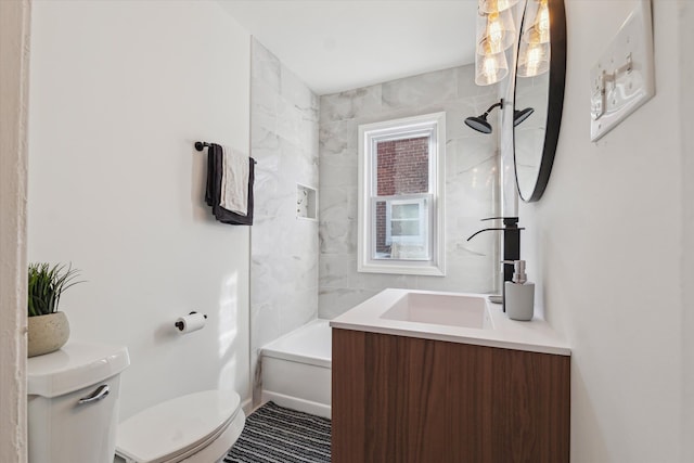 full bathroom featuring vanity and toilet