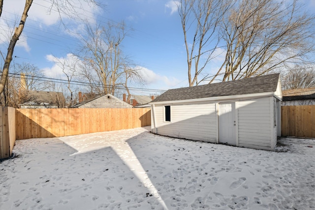 view of yard with an outbuilding and a fenced backyard