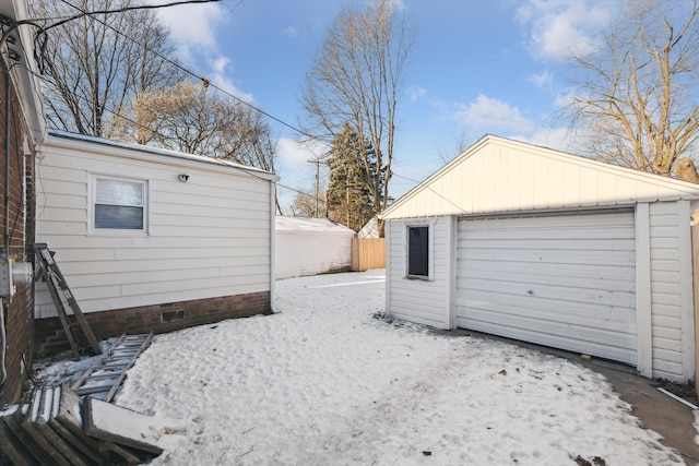 detached garage with fence