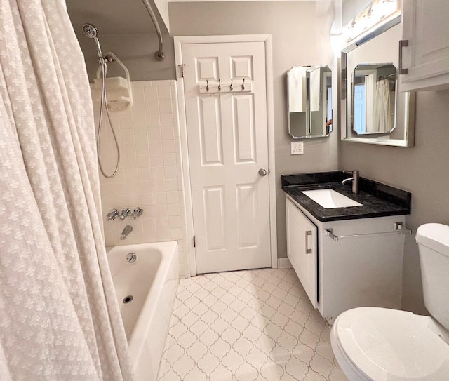 full bath featuring shower / bath combo, vanity, toilet, and tile patterned floors