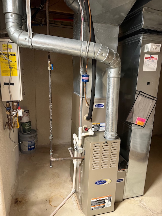 utility room with water heater