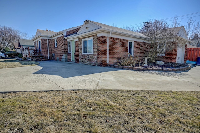 view of home's exterior featuring brick siding