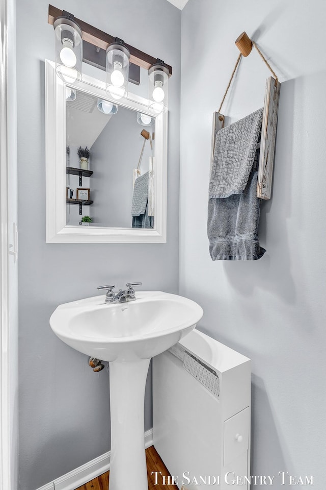 bathroom featuring baseboards