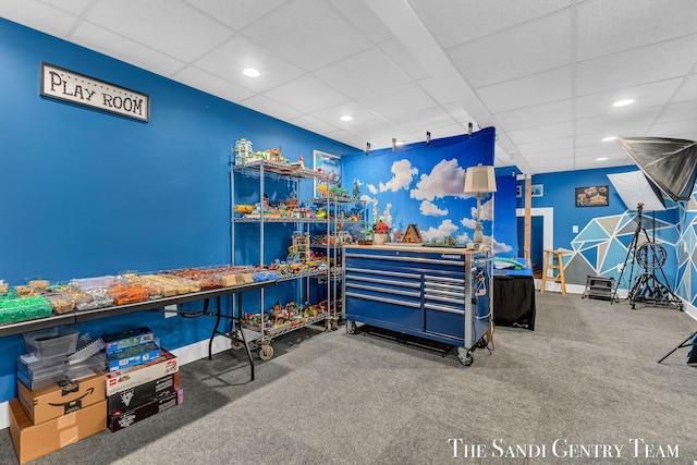 playroom with carpet floors, a paneled ceiling, baseboards, and recessed lighting