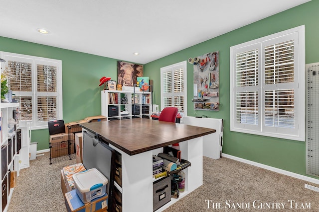 carpeted office space with recessed lighting, visible vents, a fireplace, and baseboards