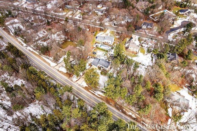 birds eye view of property with a residential view