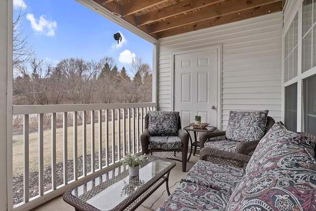 balcony with an outdoor hangout area