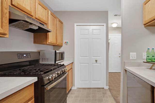 kitchen with visible vents, stainless steel appliances, light countertops, under cabinet range hood, and light brown cabinets