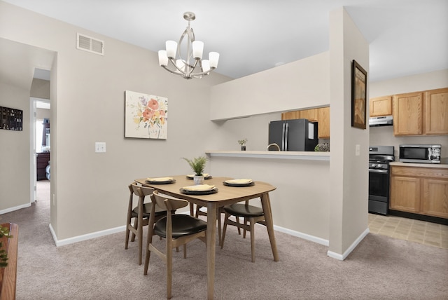 dining room with baseboards, visible vents, a chandelier, and light colored carpet