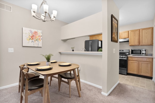 dining area featuring baseboards, visible vents, and light colored carpet