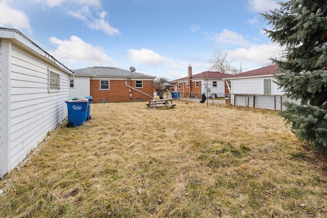 view of yard featuring fence