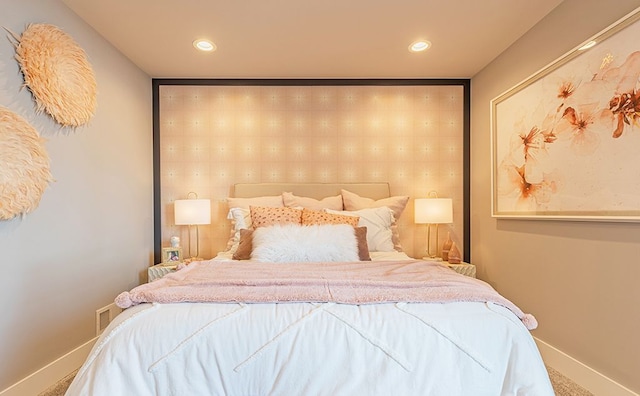 bedroom featuring recessed lighting and baseboards