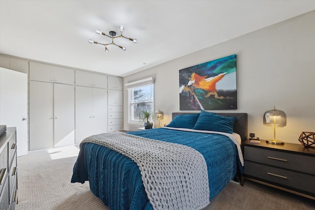 bedroom with a closet and dark colored carpet