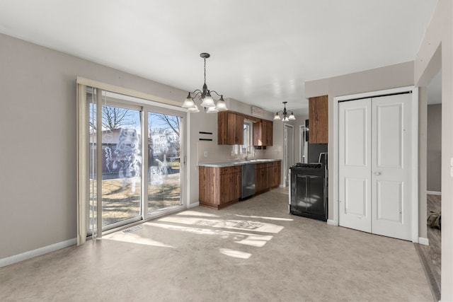 kitchen featuring black range with gas stovetop, stainless steel dishwasher, an inviting chandelier, brown cabinetry, and a sink