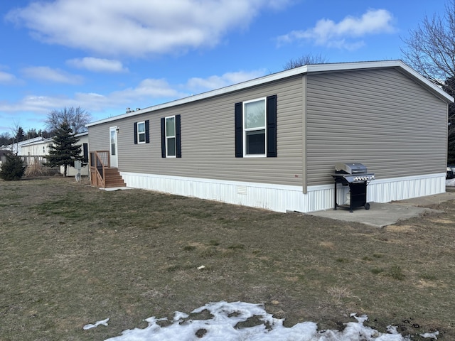 view of property exterior featuring a yard