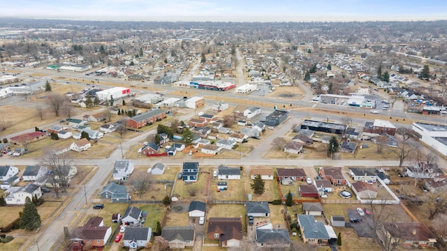 birds eye view of property with a residential view