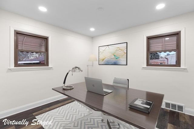 home office with visible vents, recessed lighting, dark wood-type flooring, and baseboards