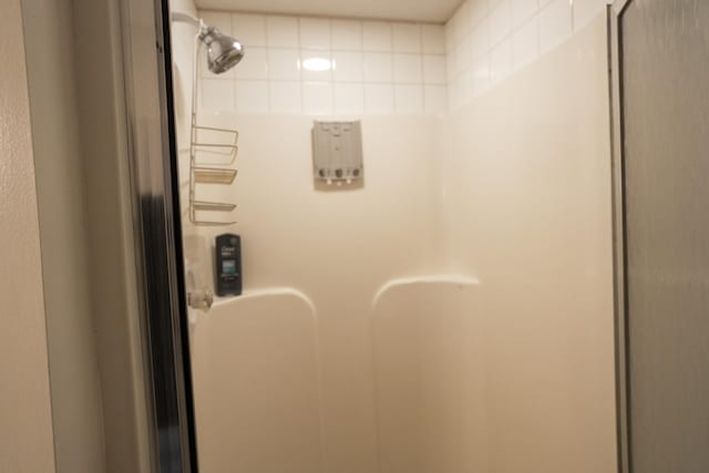 interior details with a shower stall