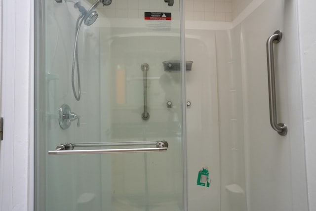 full bathroom with a stall shower