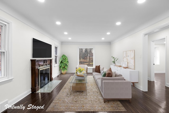 living area with visible vents, recessed lighting, a fireplace, baseboards, and dark wood-style flooring