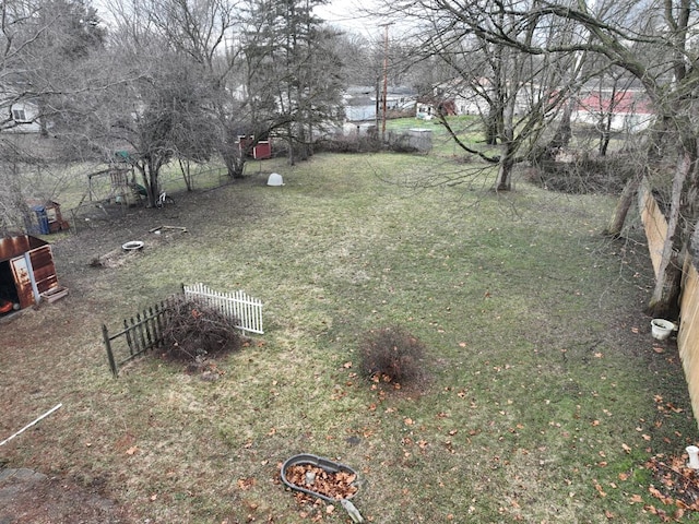 view of yard featuring fence