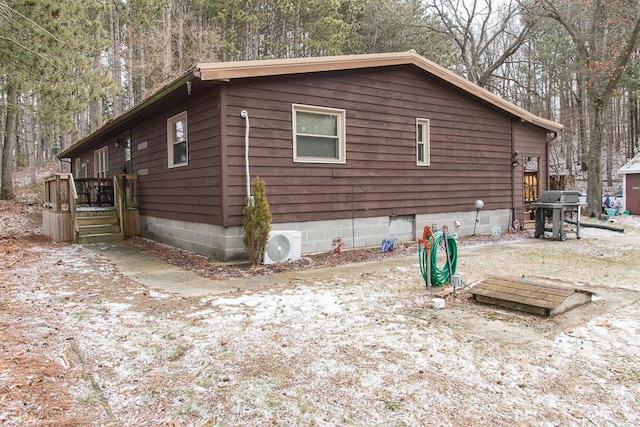 view of property exterior with ac unit