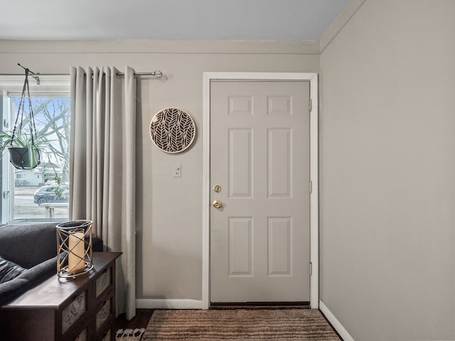 doorway with baseboards