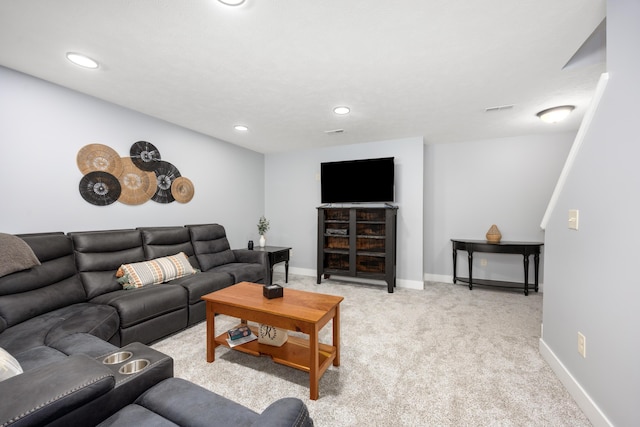 living area featuring light carpet, recessed lighting, visible vents, and baseboards