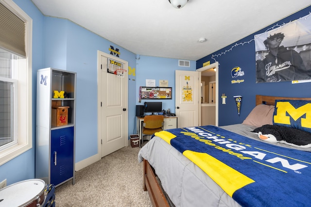 bedroom featuring visible vents and carpet flooring