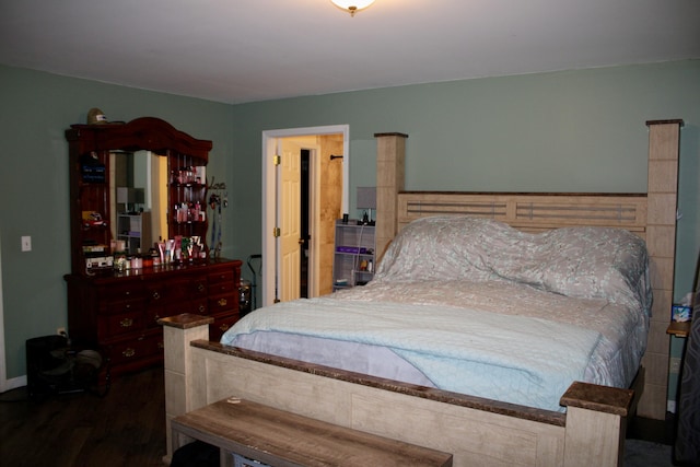 bedroom with wood finished floors